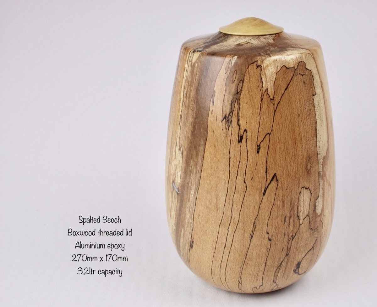 Spalted Beech with Aluminium epoxy and a Boxwood lid.